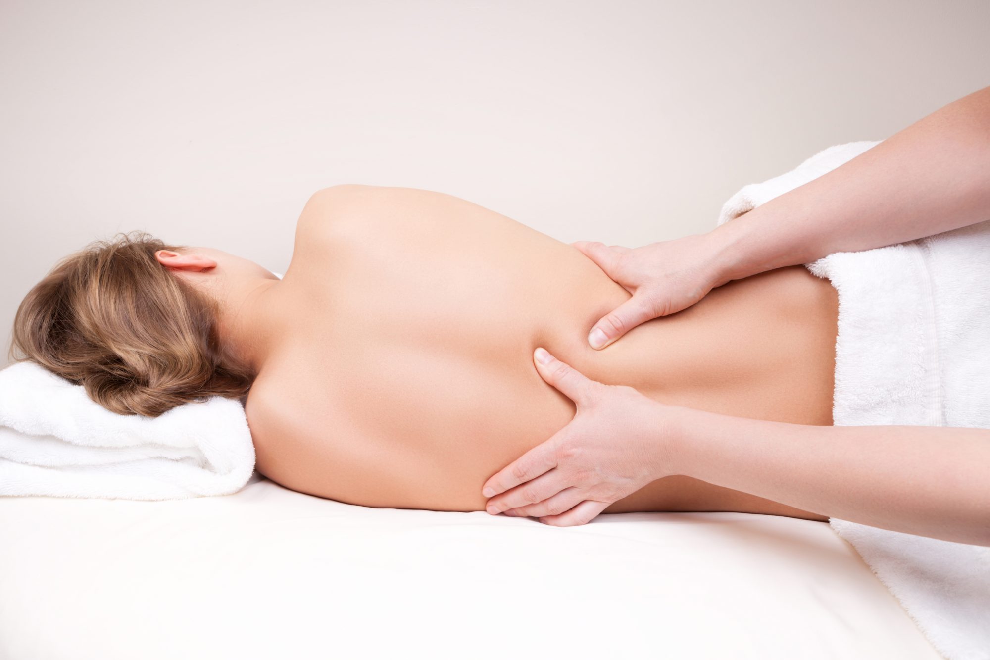 Deep tissue massage on the woman