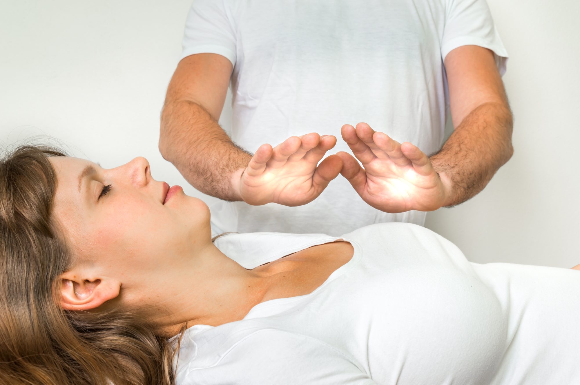 Woman getting reiki healing